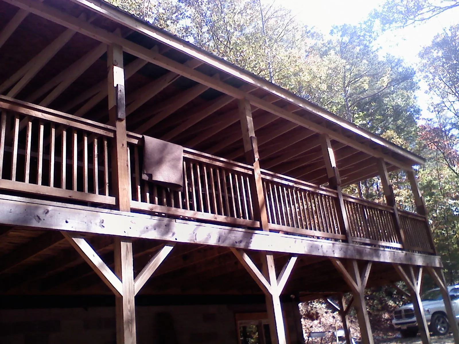 Timber framing under a new elevated porch and deck — Roof Leak Repair in Fort Drum by Roofing Brothers